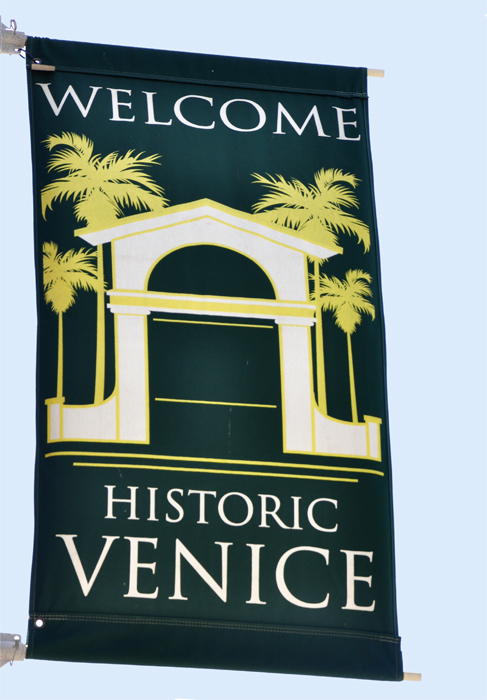 sign on a lightpole - welcome to Historic Venice
