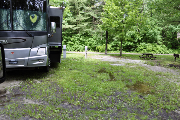 the RV of the two RV Gypsies on a wet campsite