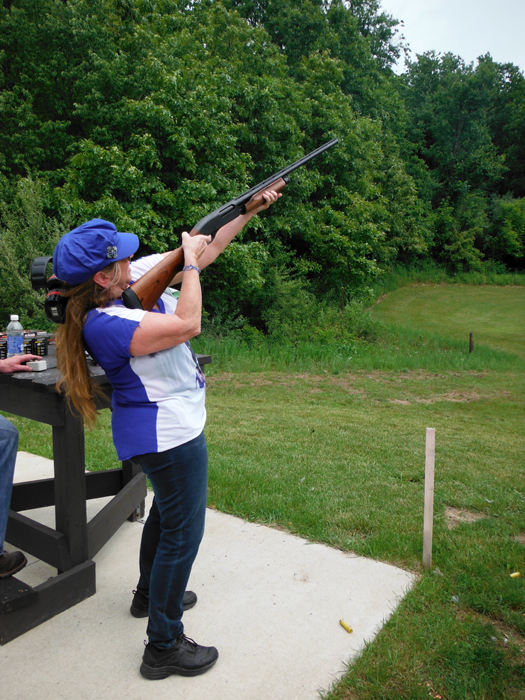 Karen Duquette shooting at the clay pigeons