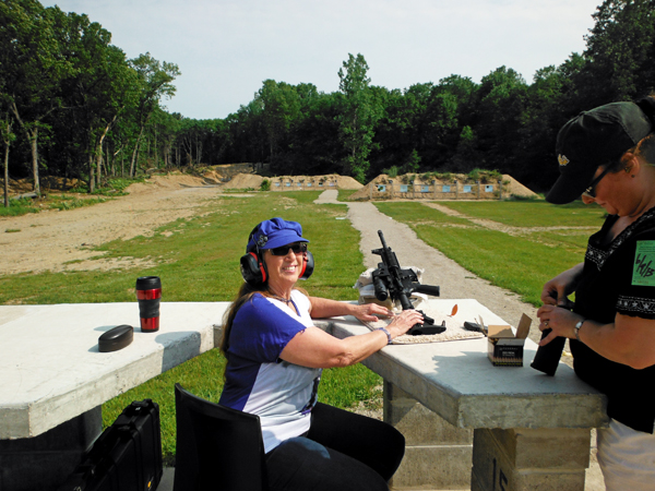 Karen Duquette and her cousin Cindy at the target range