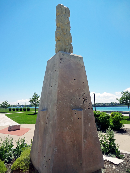 a monument with faces in Canada