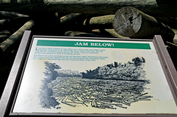 sign about log jams in the river
