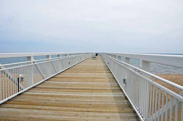 Looking down the pier towards the water.