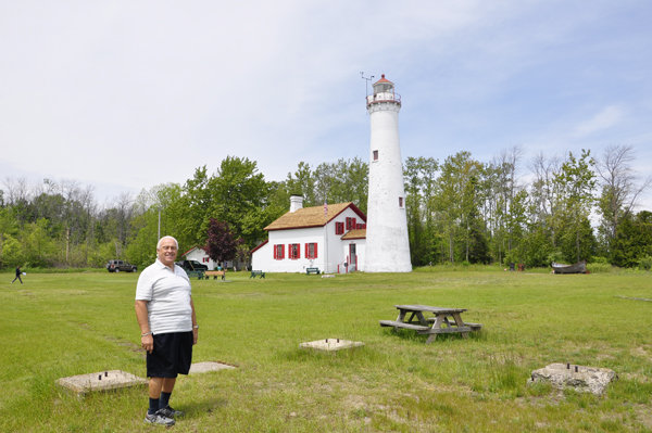 Lee Duquette by the Sturgeon Point Lighthouse 