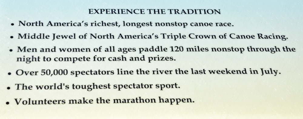 sign about the traditon of the canoe race