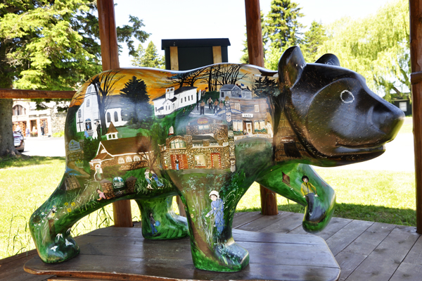a painted Village Bear statue