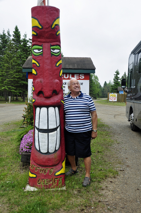 Lee Duquette and a totem pole by the campground office