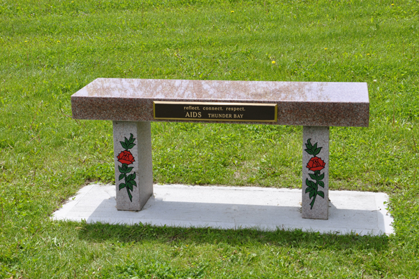 a bench dedicated to aids