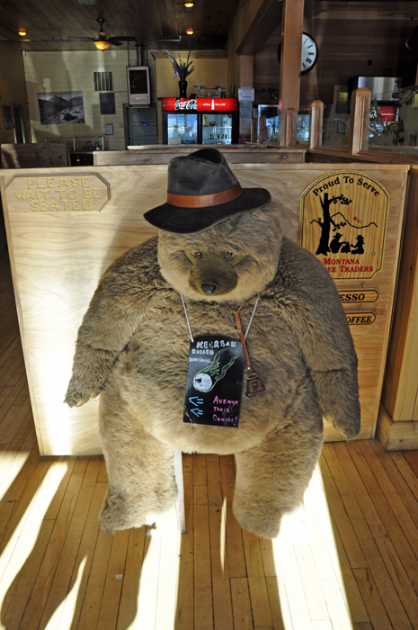 a big fat teddy bear with a top hat on