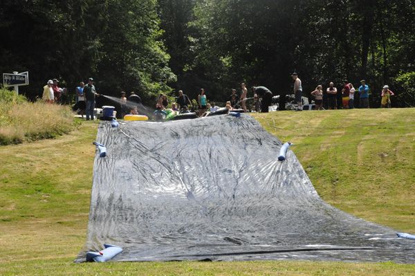 wetting down the slip and slide