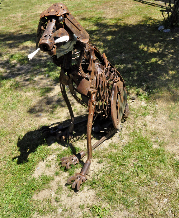 dog and newspaper sculpture