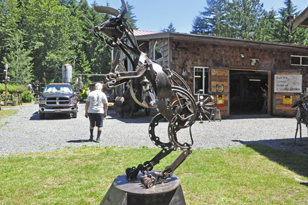 Lee Duquette and a giant rabbit sculpture