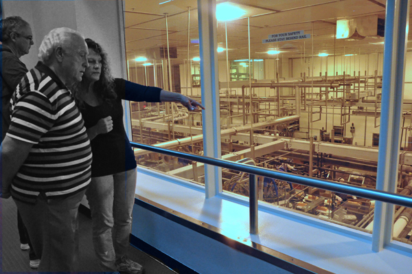 Lee Duquette and Ilse enjoy watching the Tillamook Cheese  being made