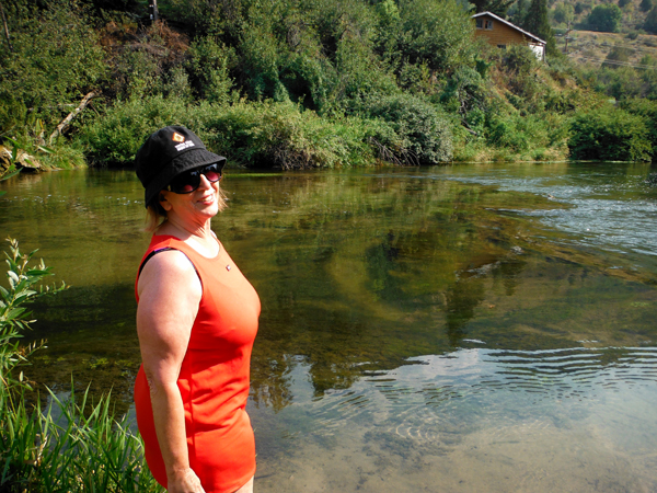 Karen Duquette trying to decide if she really wanted to go iin the cold Portneuf River