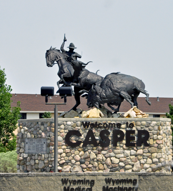 statue and welcome to Casper sign
