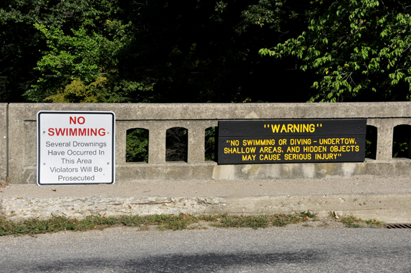 roadside bridge and warning sign