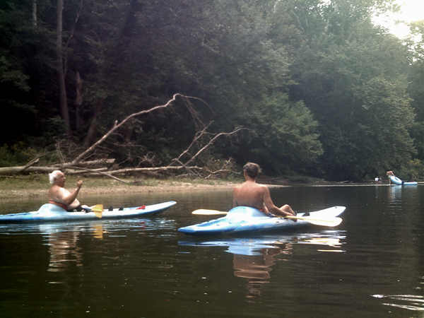 Lee and Terry converse while kayaking