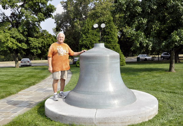 Lee Duquette with a bell placed on the ground for size reference