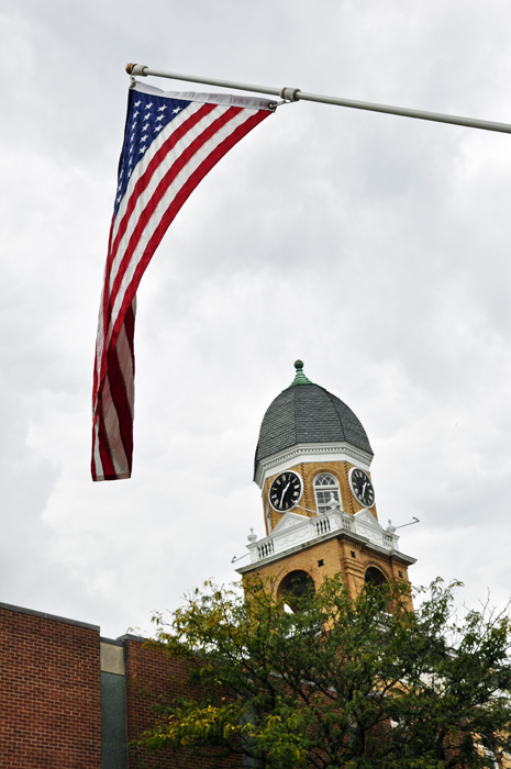 USA flag and clock tower