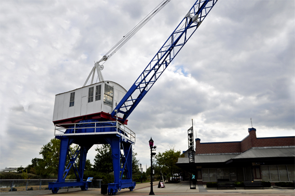 a Large Crane on the Riverfront: