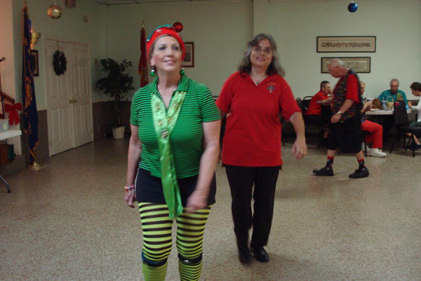 Karen Duquette, the elf, at a dance party