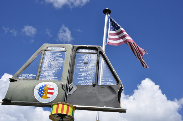 unique Vietnam memorial and U.S. flag