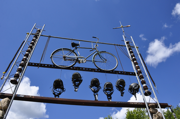 bicycles and helmets high in the air
