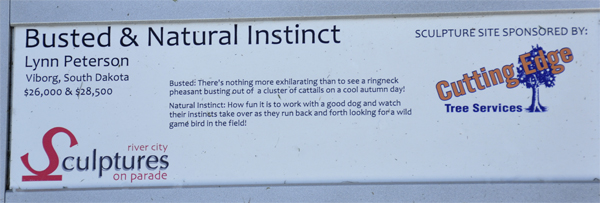 plaque for the  dog and bird sculpture