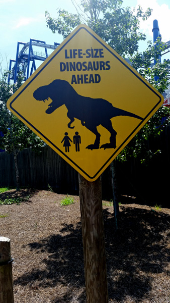 ife-size dinosaurs sign