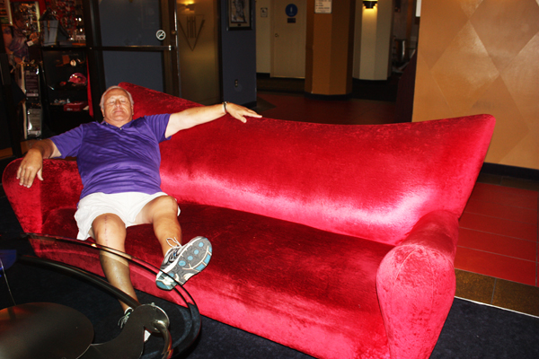 Lee Duquette relaxes in the lobby of the Heartbreak Hotel