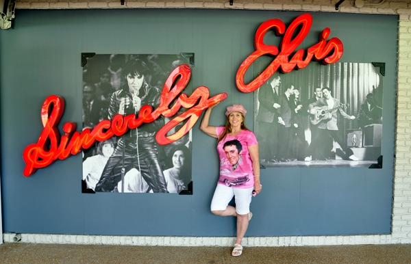 Karen Duquette at a Sincereley Elvis sign