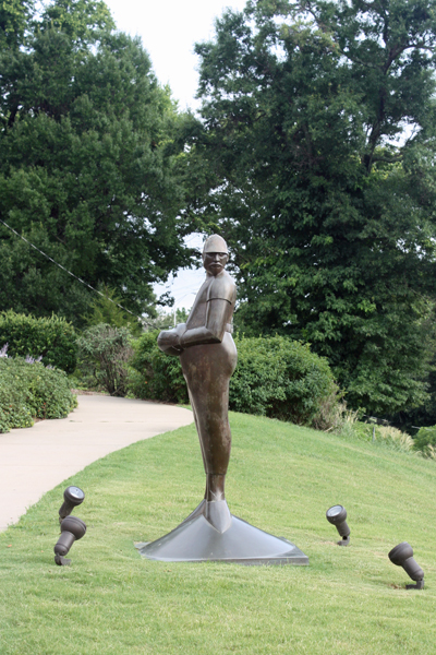 broze statue of a baseball pitcher