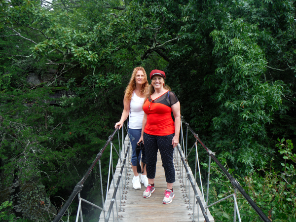 Karen Duquette and her sister on Swing-A-Long Bridge at Rock City