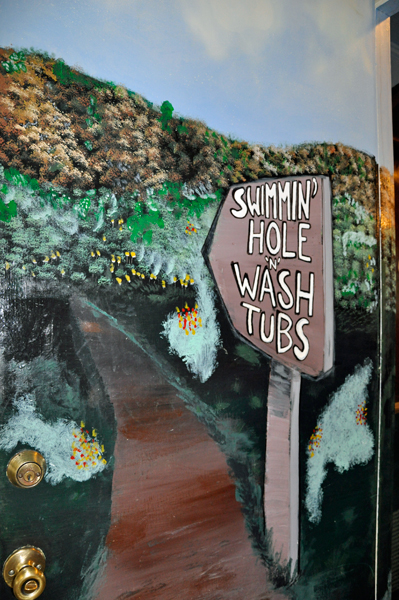 Painted signs in the laundry room at the KOA