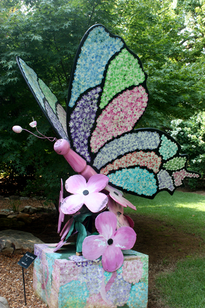 a giant butterfly and flowers in The Garden of Hope