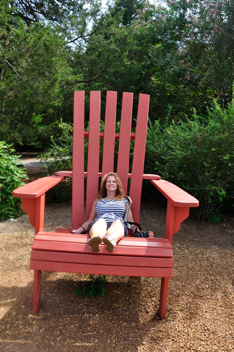 Ilse sits in a really big chair