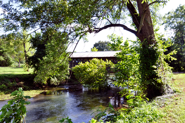view of hthe covered bridge from the suspension bridge