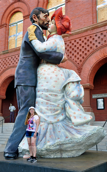 Karen Duquette and a big statue