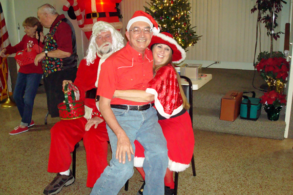 Mr and; Mrs Santa Claus and; Gary