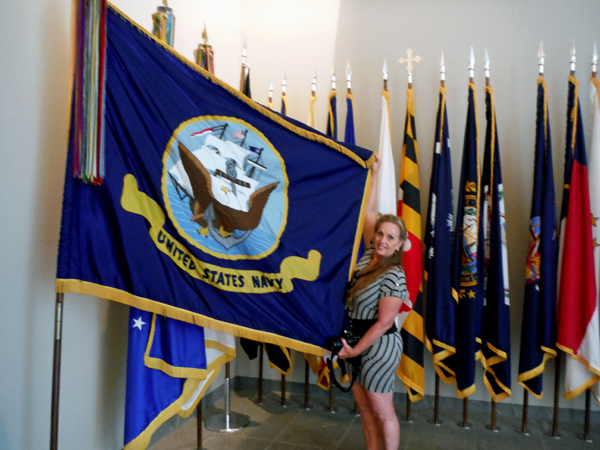 Karen Duquette and the United States Navy flag