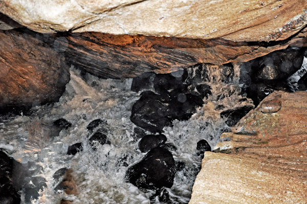 raging water inside the Noisy Cave