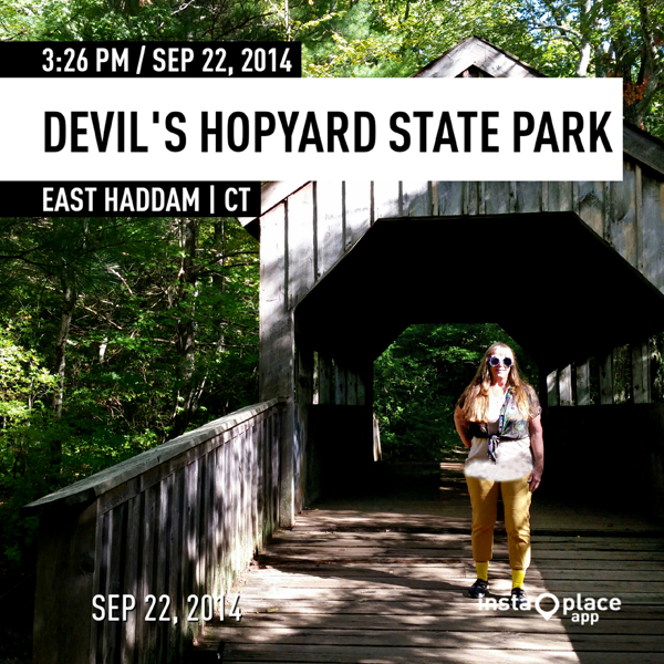 Karen Duquette on the covered bridge at Devil's Hopyard