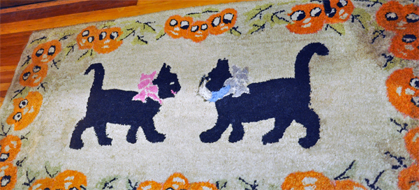 cats on a rug