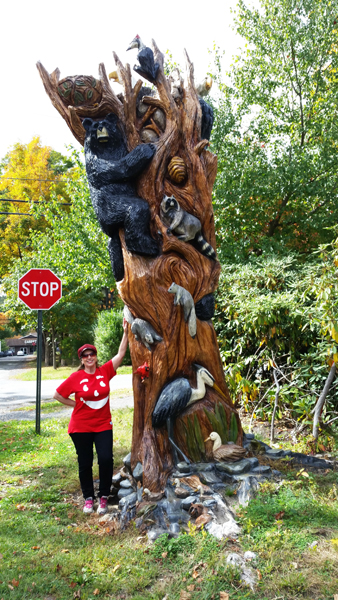 Karen Duquette and the sculptured tree