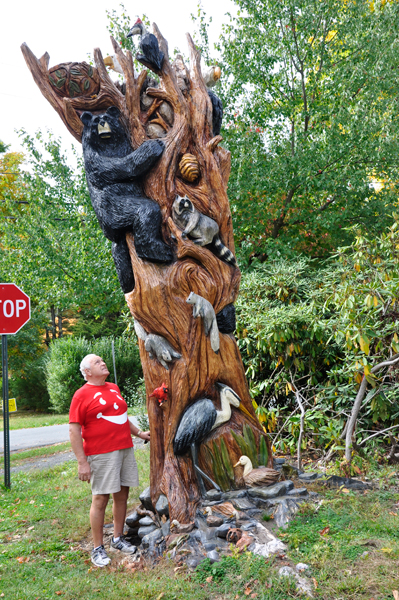Lee Duquette and the sculptured tree