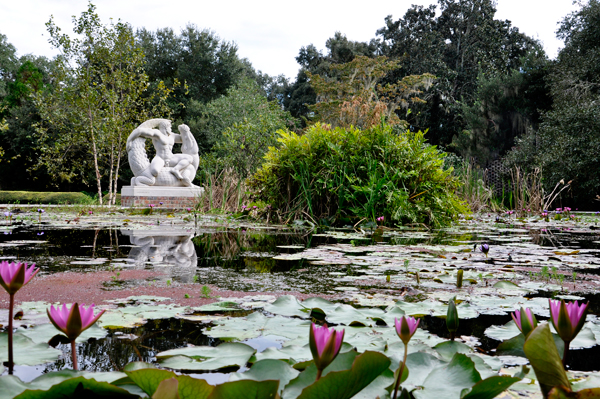 statue and pond