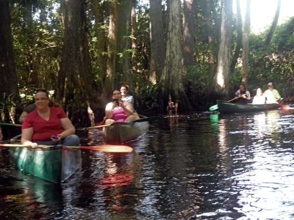 family in canoes