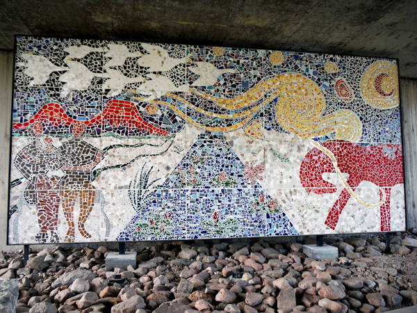 a nice ceramic mural under the bridge