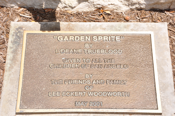 Garden Sprite statue sign