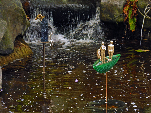 figurines in the rainforest